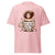 Pink t-shirt with a graphic of a person holding a coffee cup and text on a white background