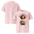 Pink t-shirt with a graphic of a woman holding a mug and text 'Mama runs the magic & macarons' on a white background.