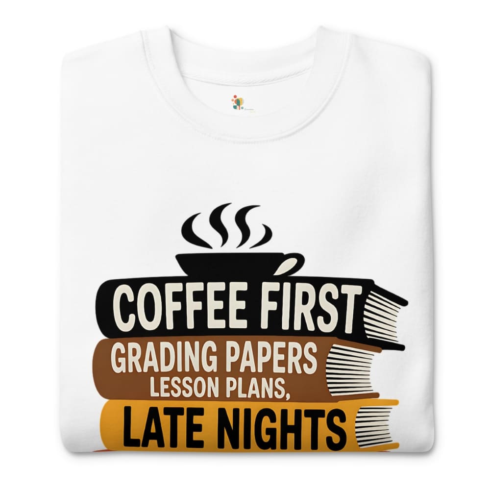 White t-shirt with a graphic design featuring coffee, books, and text on a white background