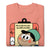 Folded pink t-shirt with cartoon character and text on a white background
