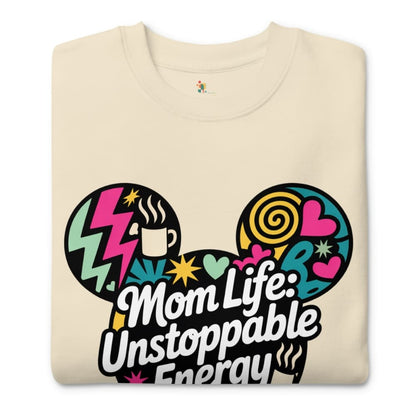 Beige t-shirt with colorful design and text 'Mom Life: Unstoppable Energy' on a white background