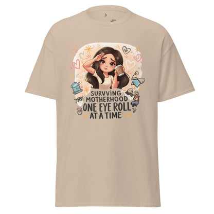 Beige t-shirt with cartoon character and humorous text on a white background