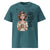 Teal t-shirt with an illustration of a woman holding a mug and text on a white background