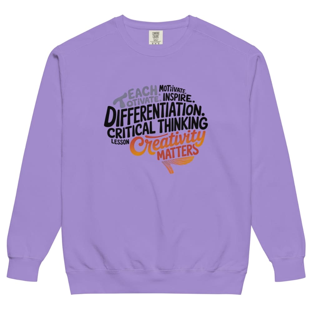 Purple sweatshirt with motivational text design on a white background