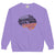 Purple sweatshirt with motivational text design on a white background