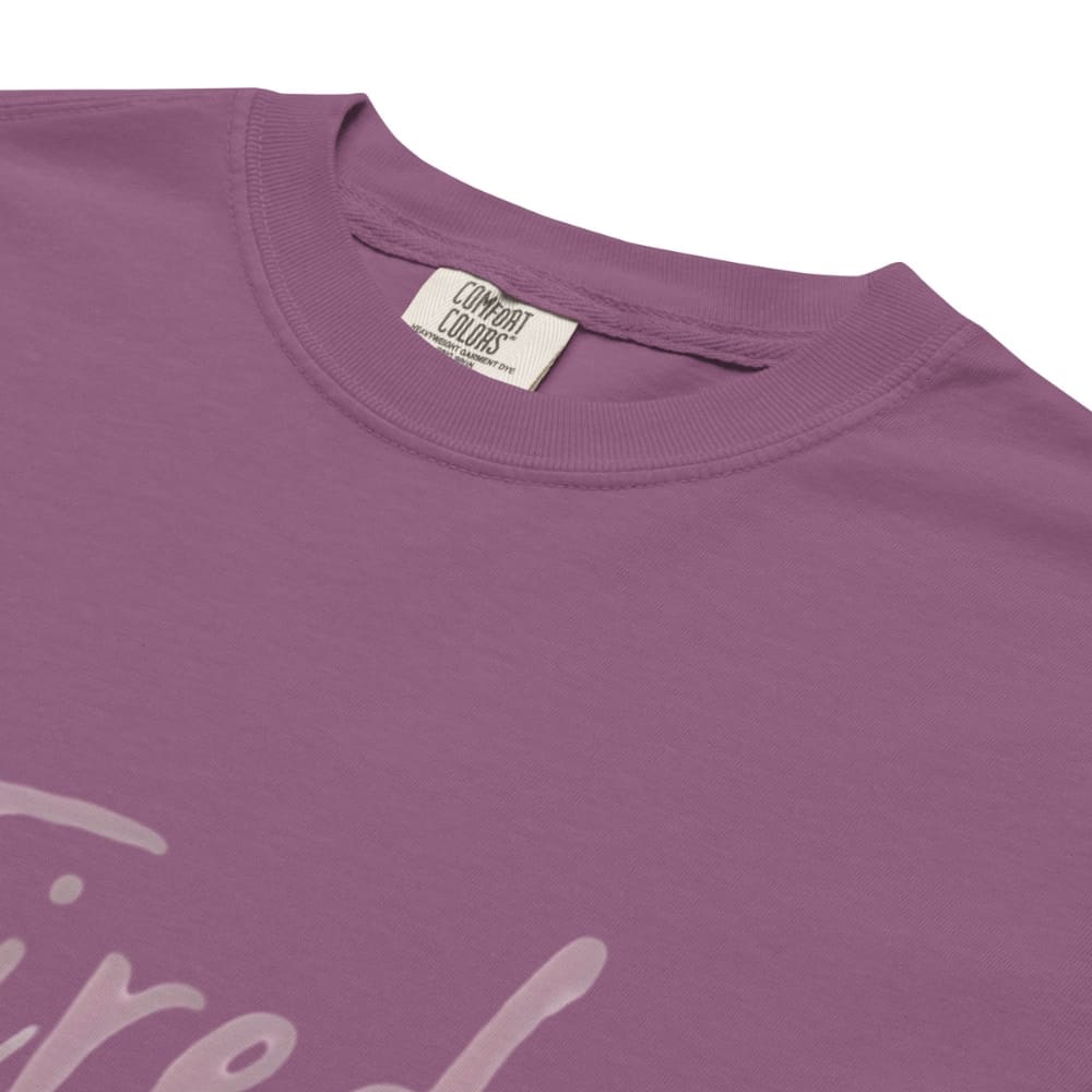 Garment-dyed relaxed fit t-shirt with motivational quote “Tired But Thriving” in modern handwritten script