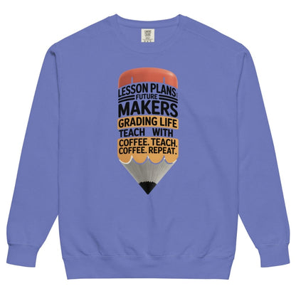 Blue sweatshirt with a graphic design and text on a white background