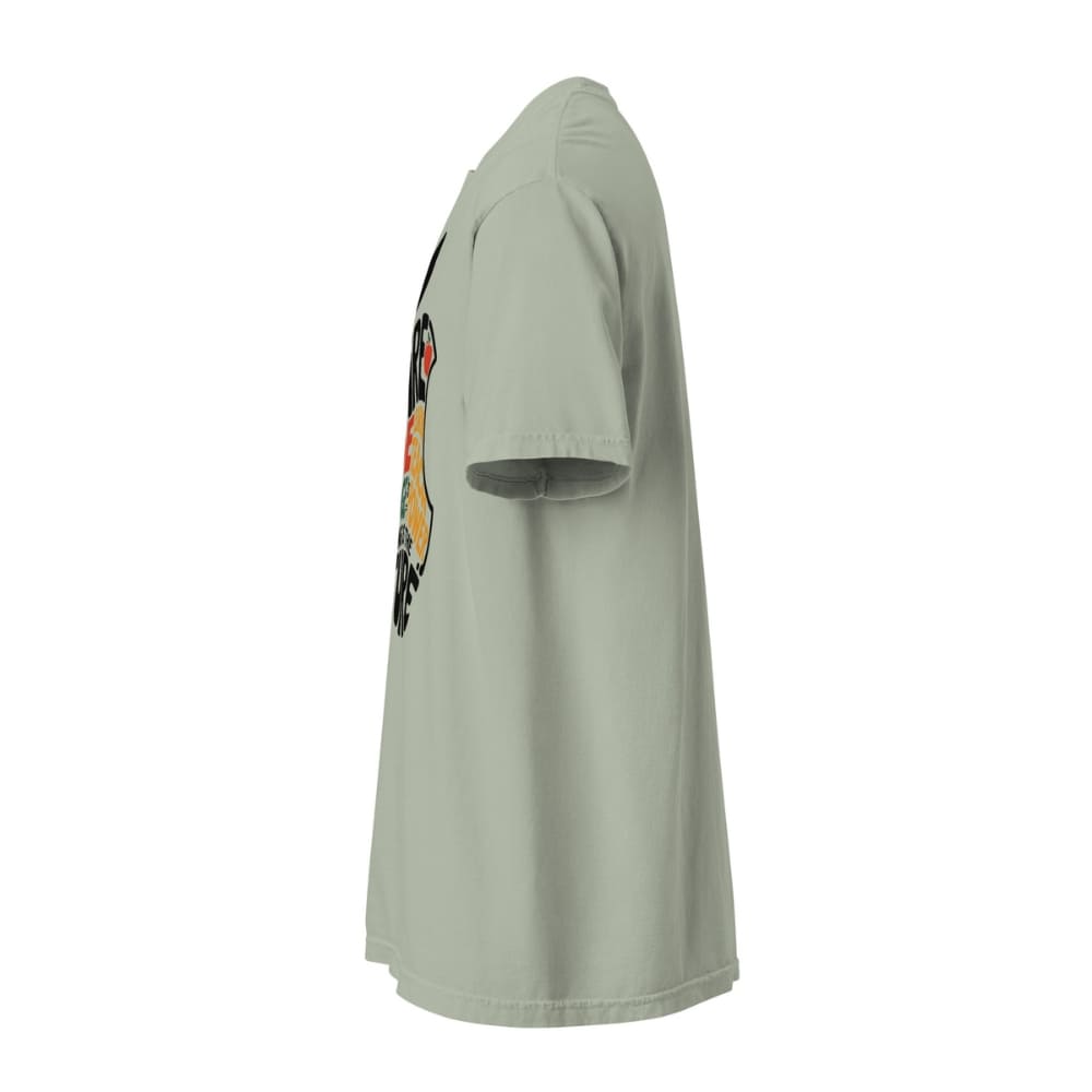 Light green t-shirt with a colorful graphic on the sleeve against a white background