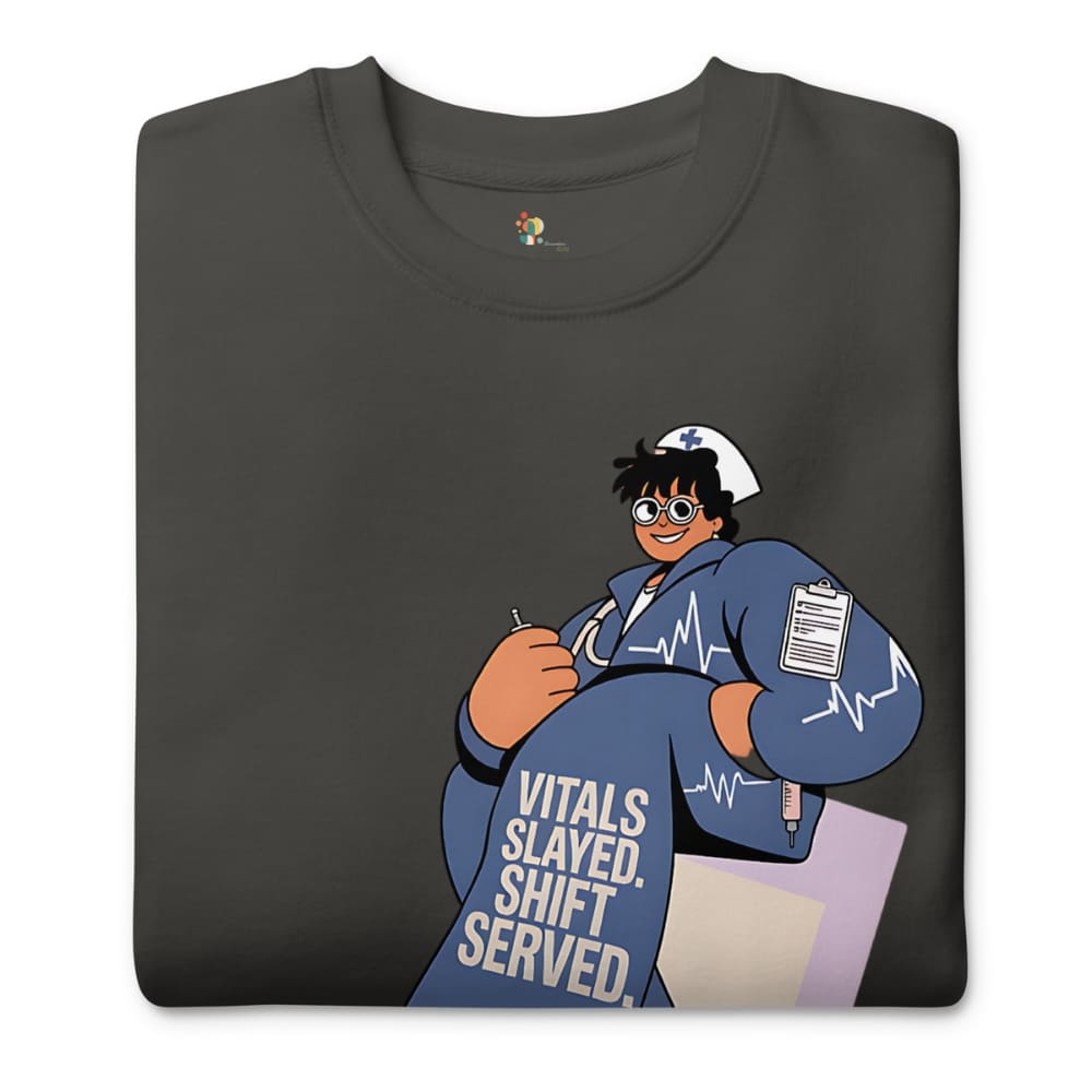 Folded black t-shirt with a cartoon character and text 'Vitals Slaved, Shift Served' on a white background
