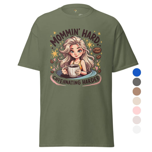 Green t-shirt with a graphic of a woman holding a coffee cup and text 'Mommin' Hard, Caffeinating Harder' on a white background.