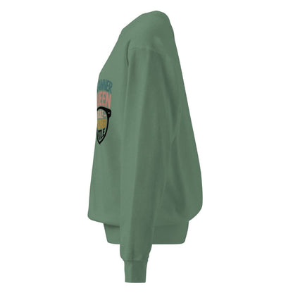 Green sweatshirt with a colorful graphic on the sleeve against a white background