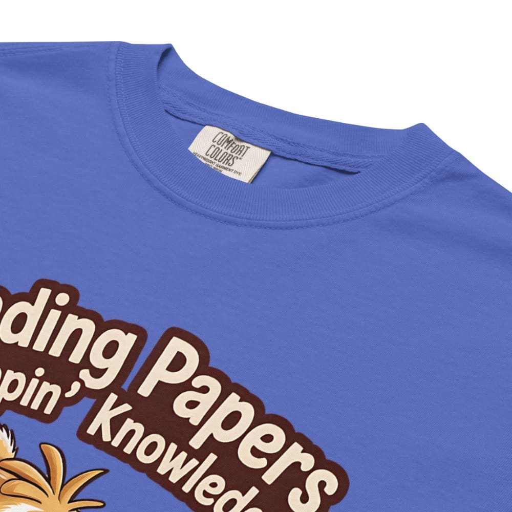 Blue t-shirt with brown text and a logo on a white background