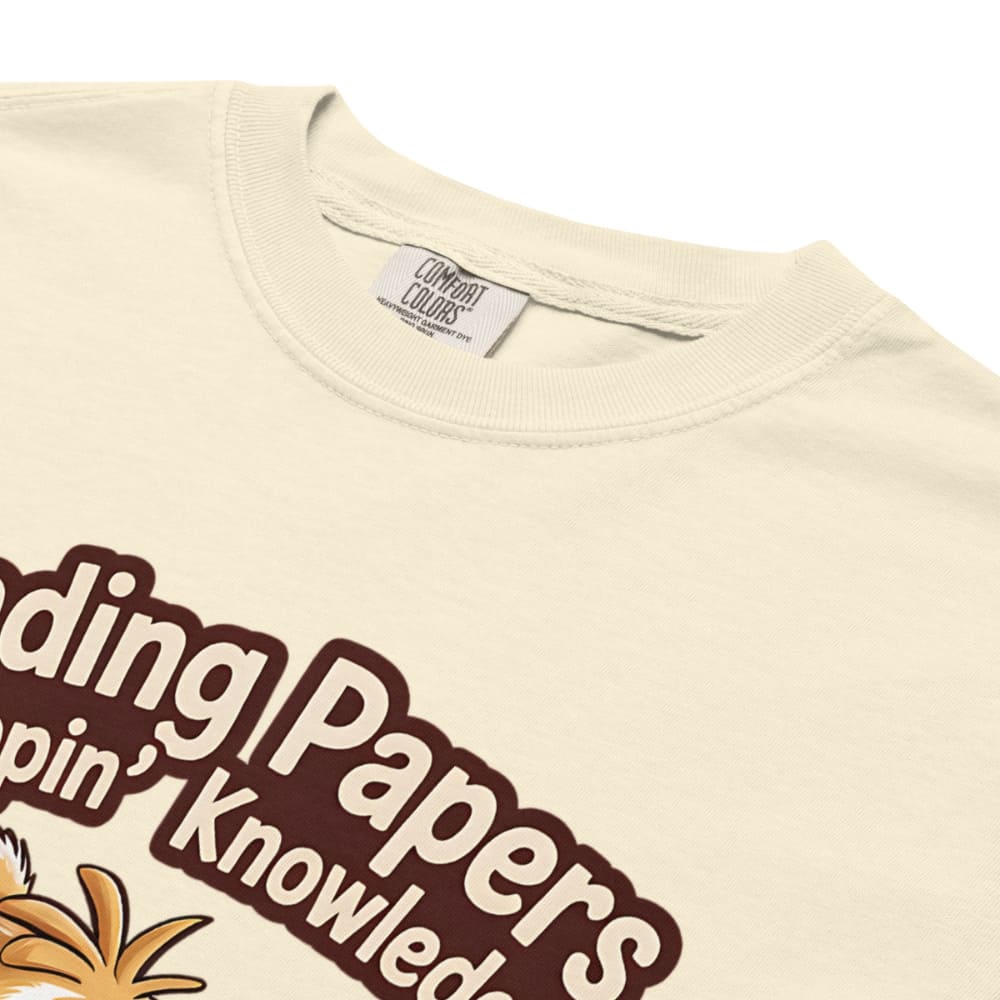 Beige t-shirt with brown text and a pineapple graphic, featuring Comfort Colors label.