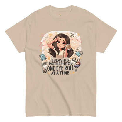 Beige t-shirt with cartoon character and humorous text on a white background