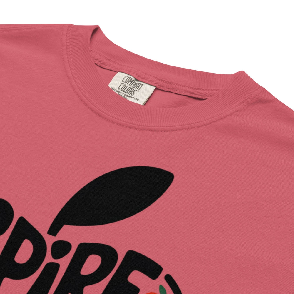Pink t-shirt with black text and a leaf design, featuring Comfort Colors label.
