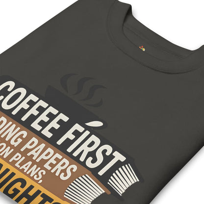 Black t-shirt with 'Coffee First' text design on a white background