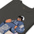 Black t-shirt with cartoon character design on a white background