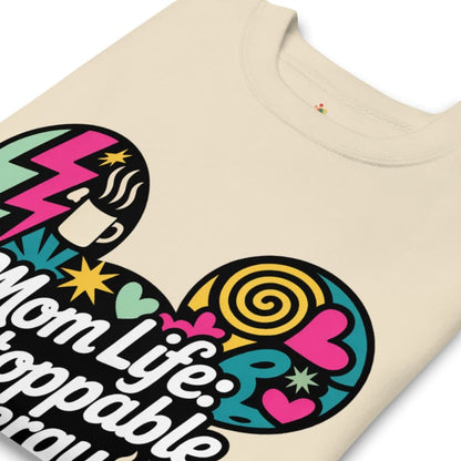 Beige t-shirt with colorful graphic design and text on a white background