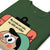 Green t-shirt with a cartoon character and text design on a white background