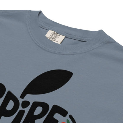 Blue t-shirt with black logo and 'Comfort Colors' label on a white background