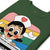 Green t-shirt with a cartoon character design on a white background