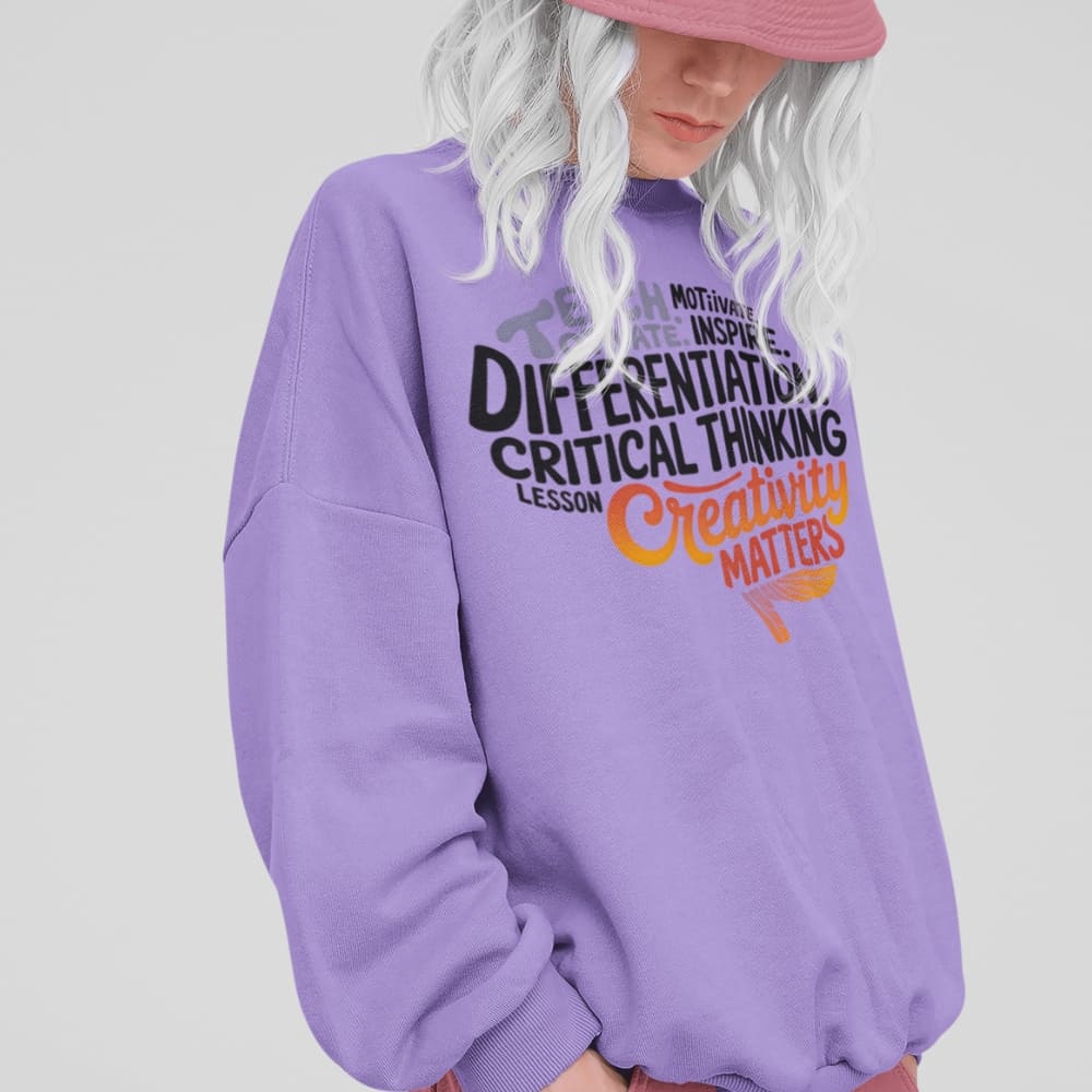 Person wearing a purple sweatshirt with text on a plain background