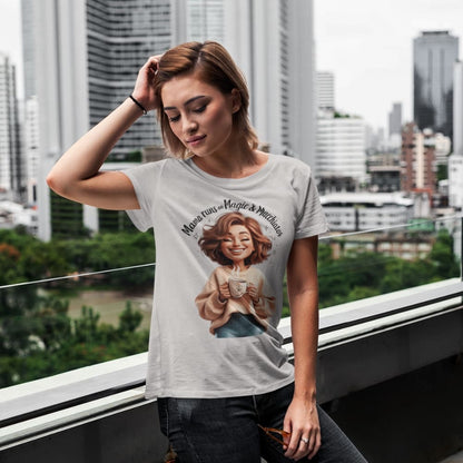 Woman wearing a t-shirt with a graphic design of a woman holding a coffee cup, standing in an urban setting.