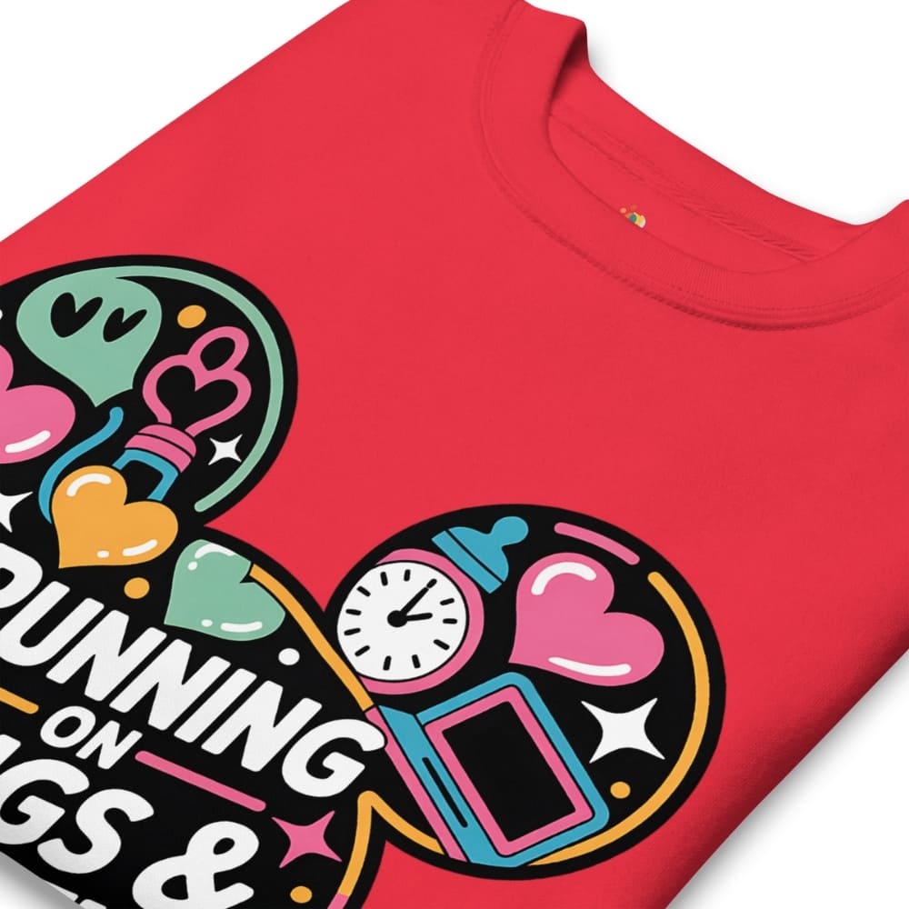 Red t-shirt with colorful graphic design and text on a white background