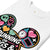 White t-shirt with colorful graphic design featuring text and symbols on a white background