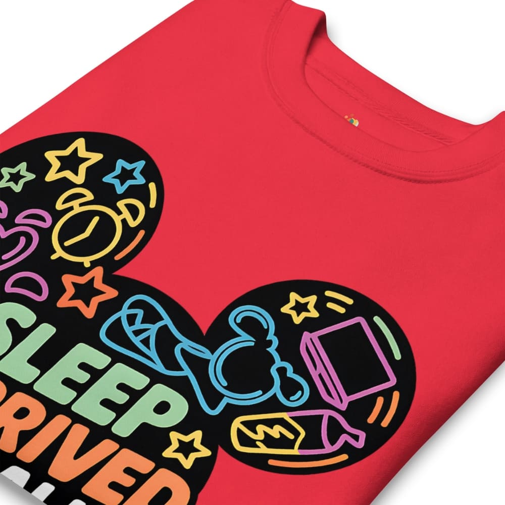 Red t-shirt with colorful graphic design on a white background