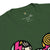 Green t-shirt with colorful graphics and text on a white background