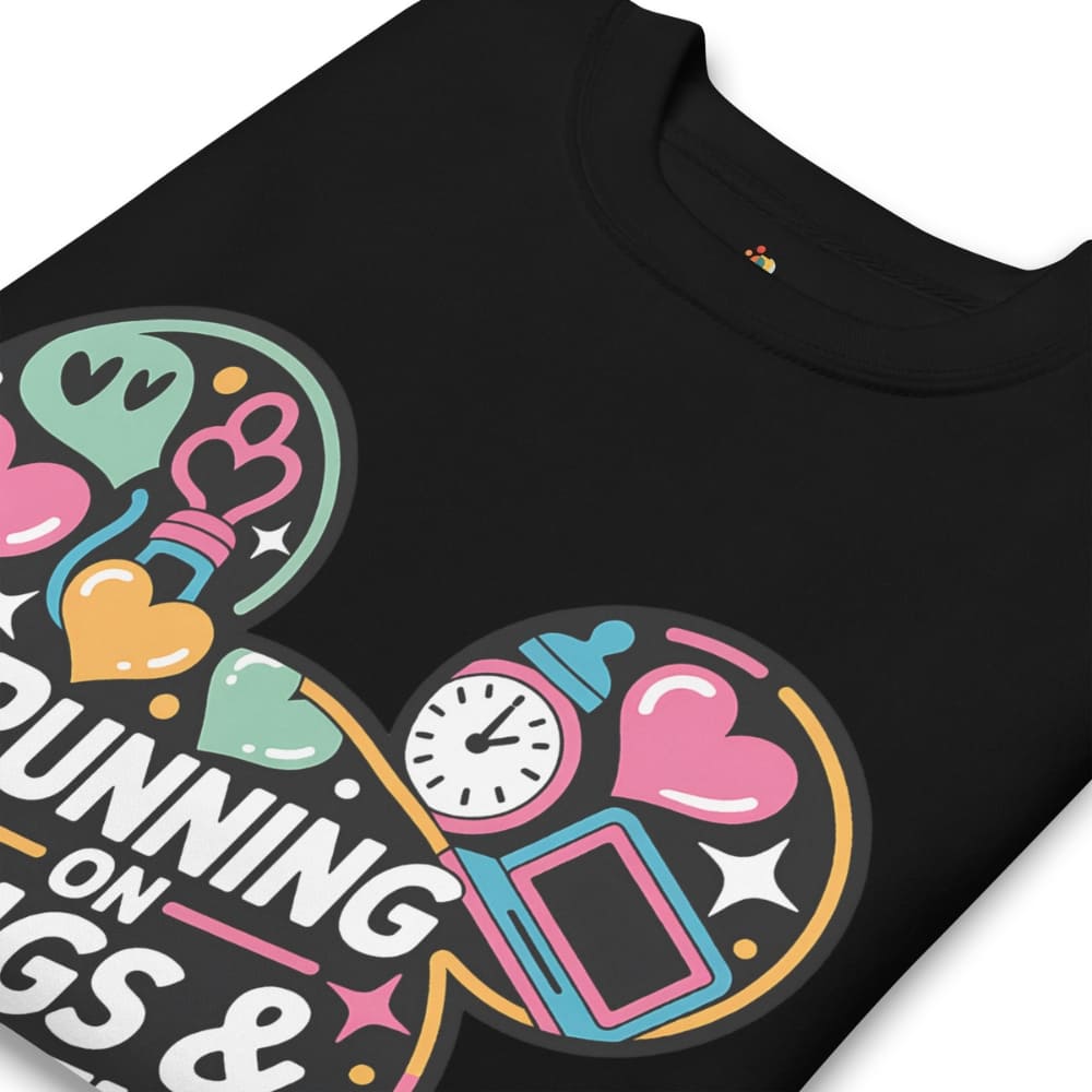 Black t-shirt with colorful graphic design featuring text and symbols on a white background