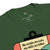 Green t-shirt with a graphic and text 'My scrubs are cute, my skills are killer.'
