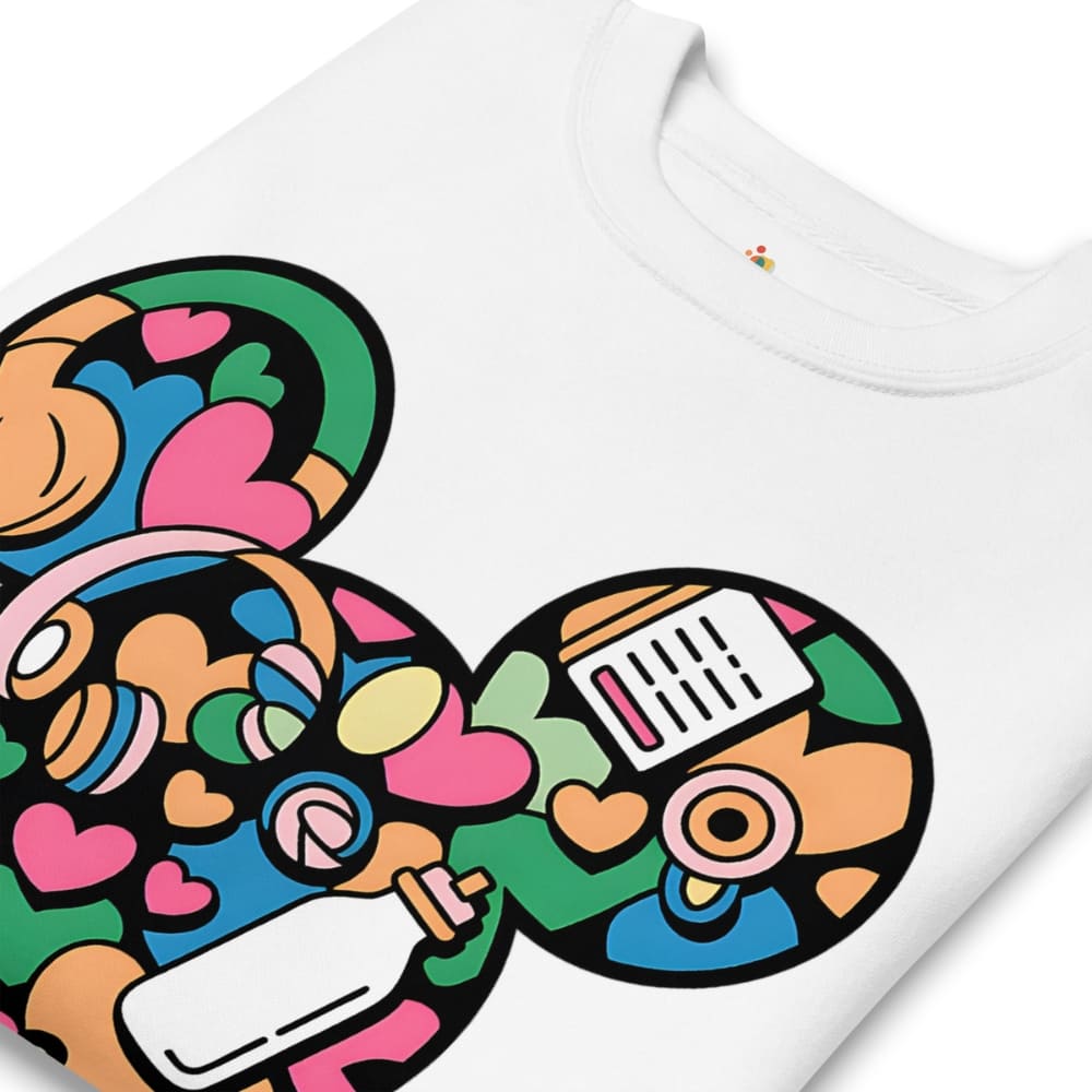 Colorful graphic design on a white t-shirt with a bottle, hearts, and abstract shapes.