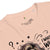 Peach  t-shirt with text and graphics on a white background