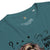 Teal t-shirt with text and graphics on a white background