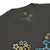 Black t-shirt with colorful graphics and brand logo on a white background