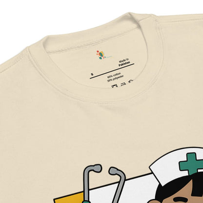 Beige t-shirt with cartoon character and stethoscope graphic, brand label visible.