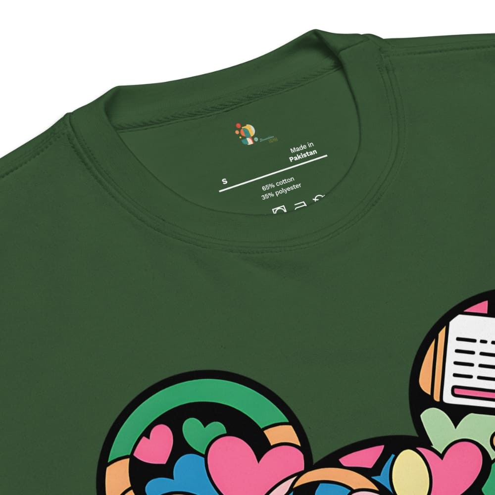 Green t-shirt with colorful graphics and a label on the collar.