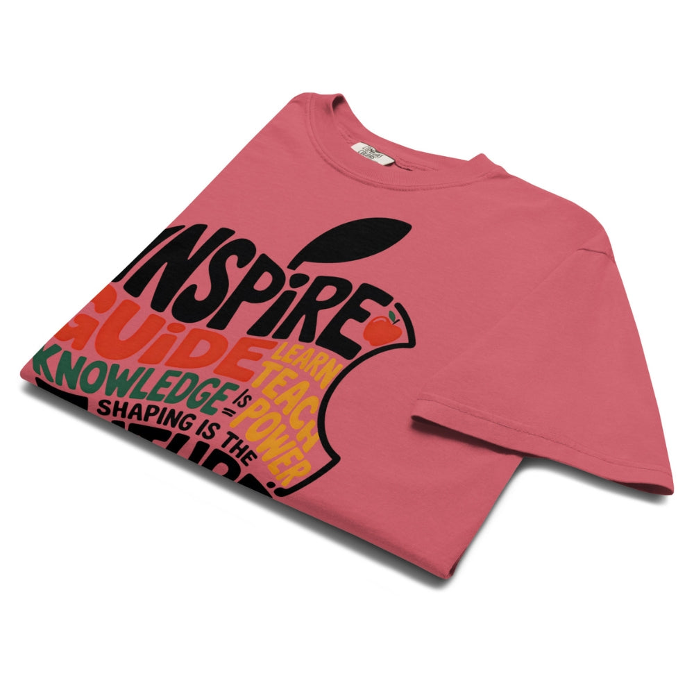 Pink t-shirt with text and graphics on a white background