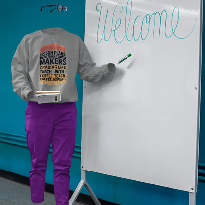 Person wearing a sweatshirt with a humorous quote, standing next to a whiteboard with 'Welcome' written on it.