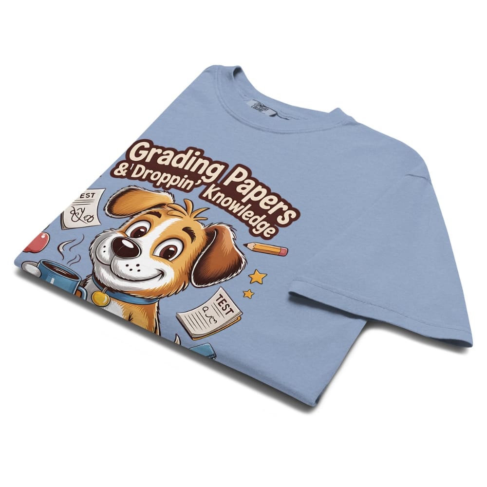 Blue t-shirt with a cartoon dog graphic and text on a white background