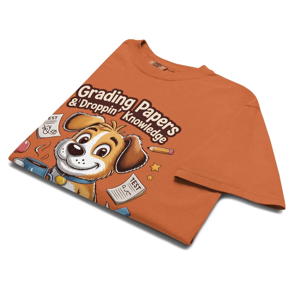 Orange t-shirt with a cartoon dog graphic and text on a white background
