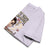 Folded light purple sweatshirt with graphic design on a white background