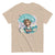 Beige t-shirt with a graphic of a cartoon character and text 'Keep talking, I'm chanting your attitude' on a white background.