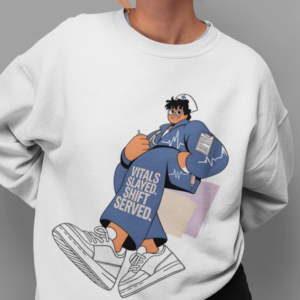 White sweatshirt with a cartoon character and text on a gray background