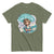 Green t-shirt with an illustration of a character and text 'Keep talking, I'm changing your attitude' on a white background.