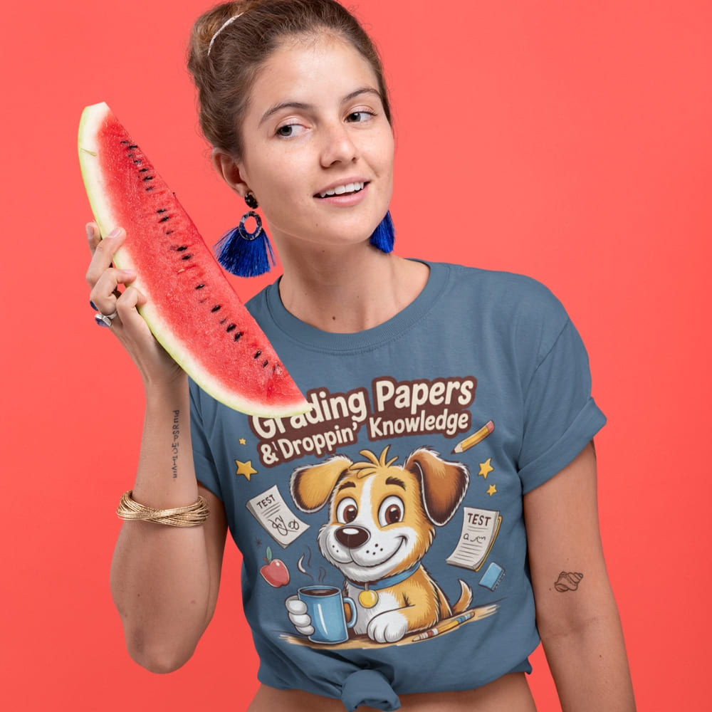 Woman wearing a blue t-shirt with a dog graphic and text, holding a watermelon slice against a red background
