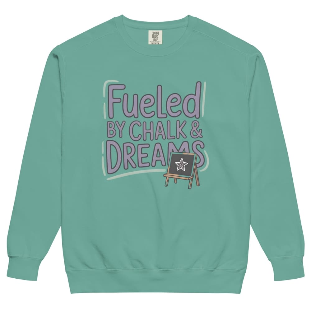 Fueled by Chalk & Dreams printed design on a vintage-style garment-dyed sweatshirt with chalkboard illustration – soft fleece ideal for teachers