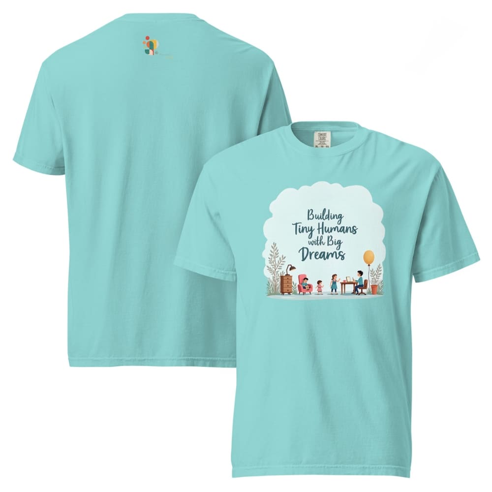 Illustrated t-shirt design with the quote "Building Tiny Humans with Big Dreams" surrounded by a family parenting scene